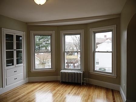 Gleaming hardwood floors and huge windows.