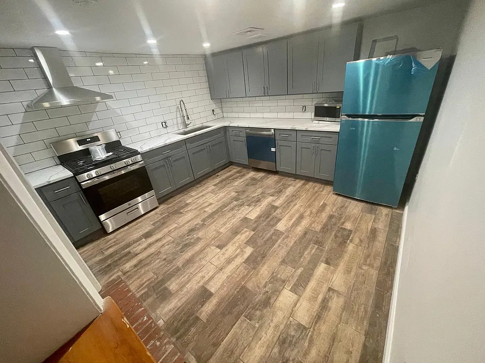 Brand new eat in kitchen with stainless steel appliances (fridge in photo still has delivery casing but is stainless steel). Lots of counter space