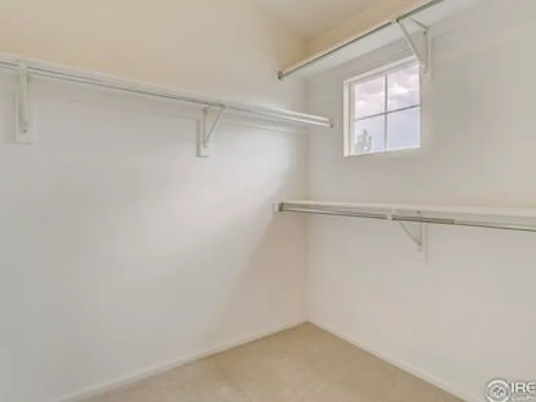 2nd Primary Suite walk-in closet (new carpet not pictured)