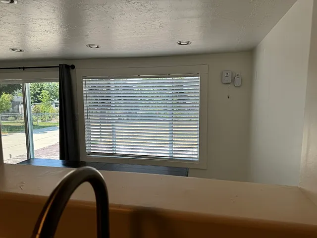 view looking down into dining and outside