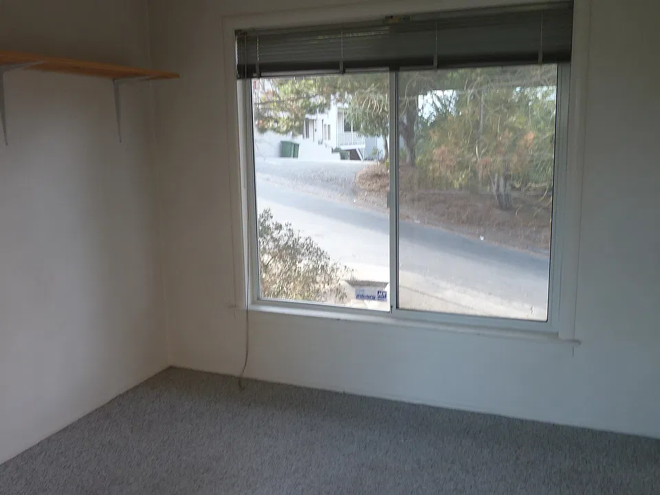 Den facing Alice Street