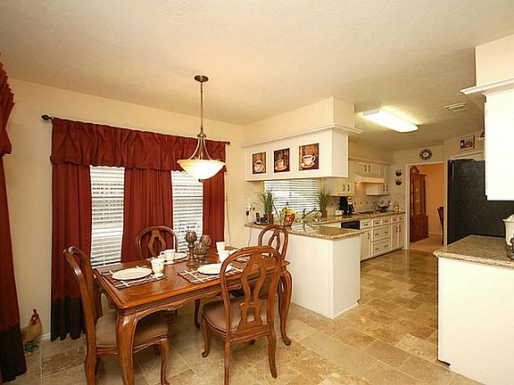 Cozy breakfast area opens to the family room and kitchen