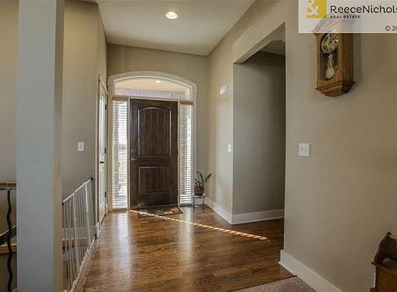 Spacious entry with beautiful hardwood floors