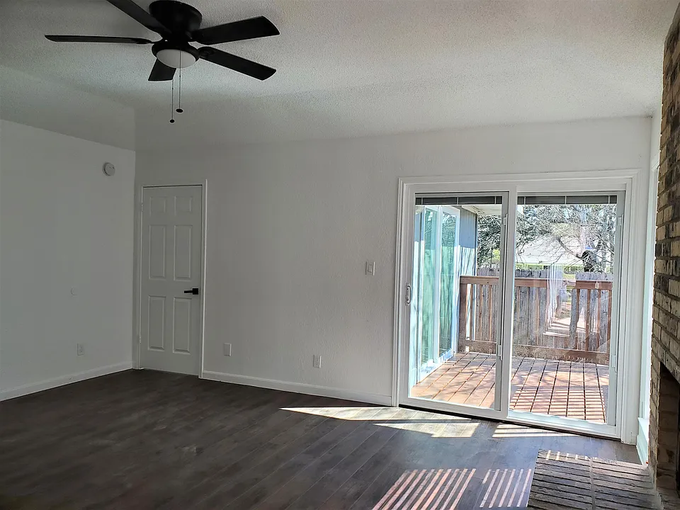 Living room with access to backyard deck
