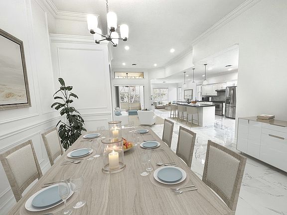 View from the main entrance - includes the dining room, living room, kitchen, and family room