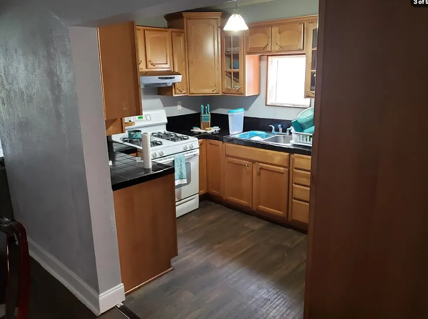 3 Bed 1 Bath Home with Raised Deck and Storage Sheds — Photo 3