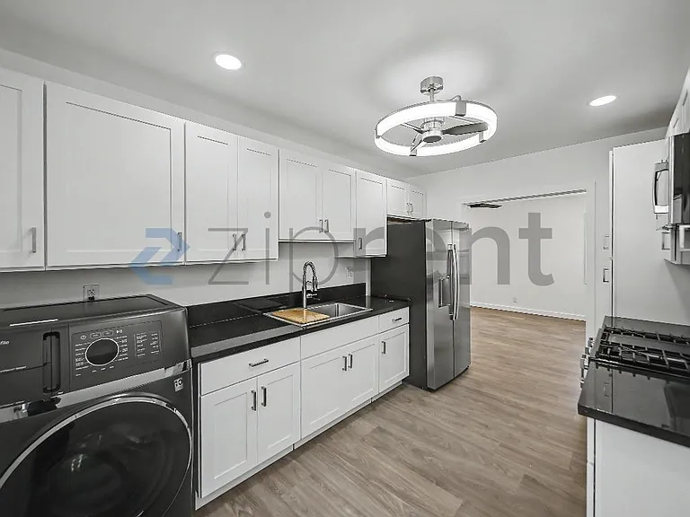 10907 S Burl Ave — Photo 7