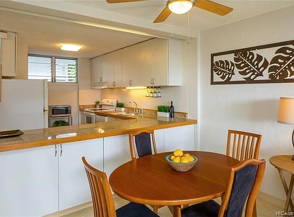 Lots of storage and counter space in this bright and airy kitchen.  Come over and enjoy this beautiful condo.