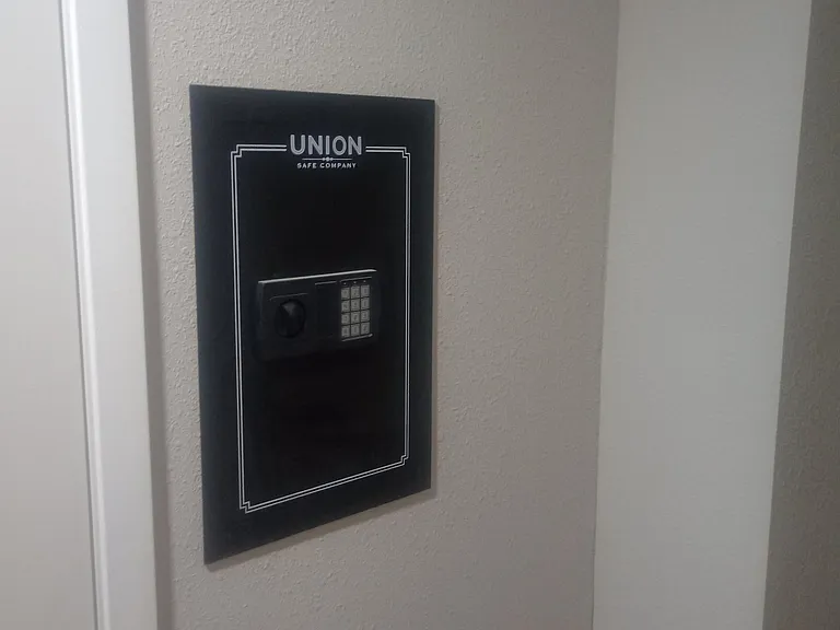 Built - in wall safe in master closet