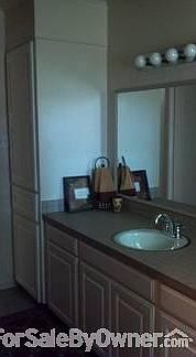 Family bath
						:
						12x7, window at far end. Deep tub with custom tile surround and counter Closet