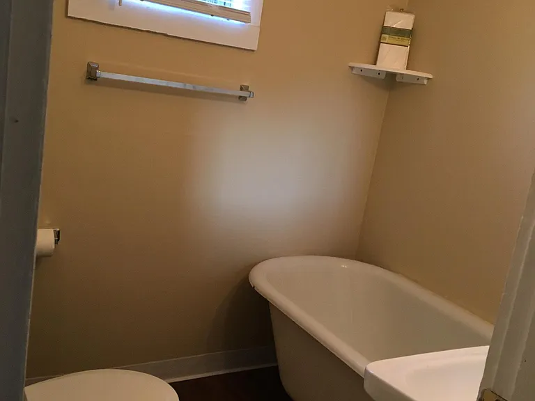 Bathroom with claw-foot tub/shower