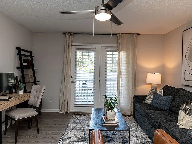 Spacious living room with overhead lighting