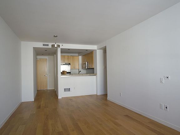 Living room facing kitchen