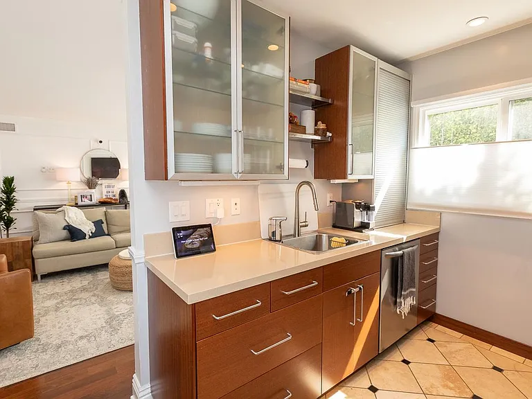 Kitchen off living room. Stainless steel appliances