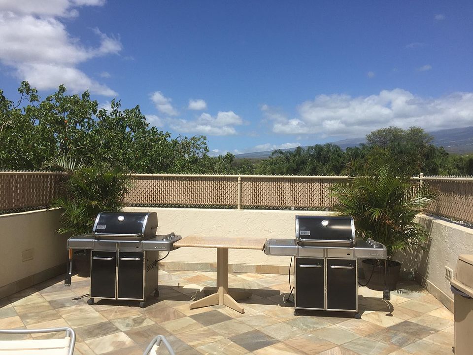 Outdoor BBQs with gas grills and Haleakala Crater view.