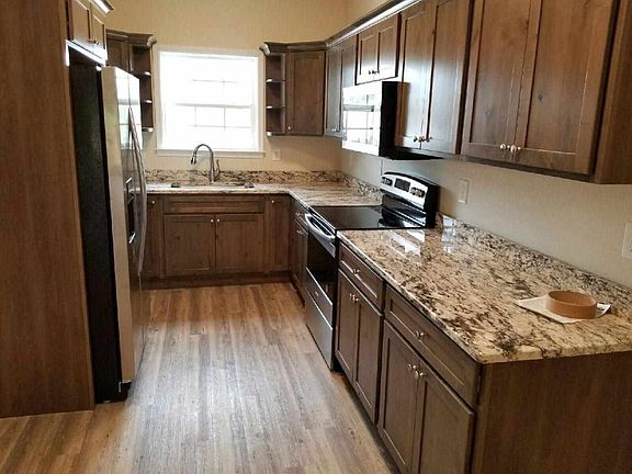 4th image of 5975 Common Ln NE Lot 7