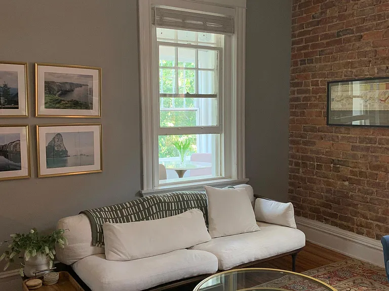 Living area overlooking breakfast nook/small dining area