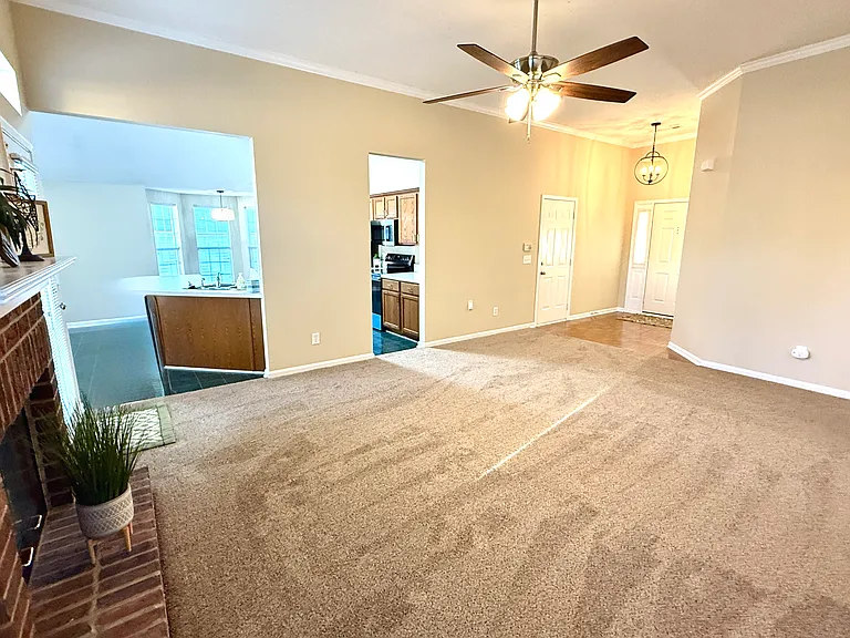 LR w/new ceiling fan and foyer with new light