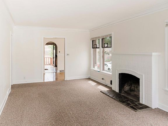 Living Room View to Dining & Kitchen