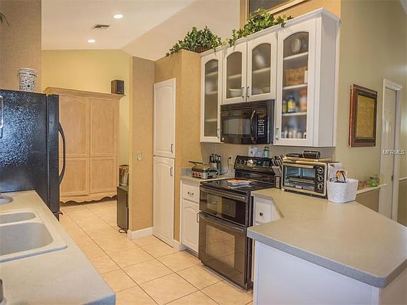 Kitchen has designer accent wall covering