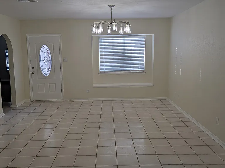 Front door and dining/living area.