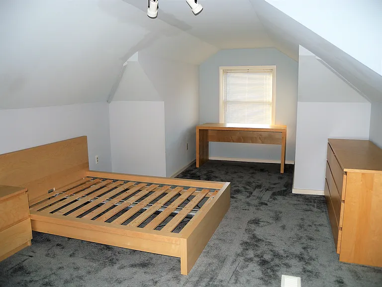Upper level bedroom with ensuite bath
