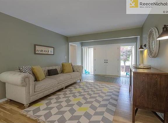 Entryway leads to open living room/dining room