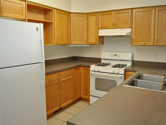 Kitchen with lots of cabinets.