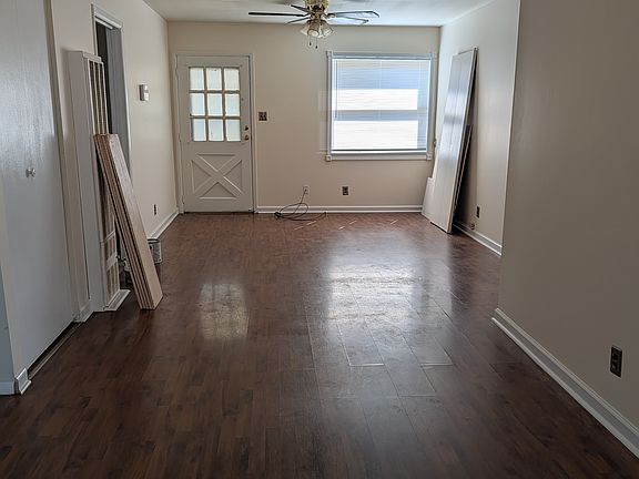 Large living area for additional dining area, formal living room...still cleaning floors!__
