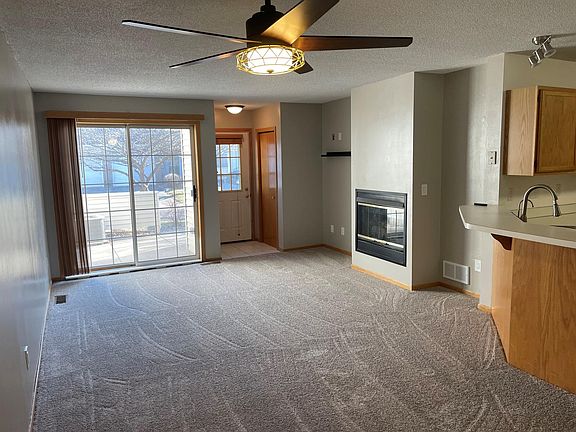 Living room with gas fireplace.