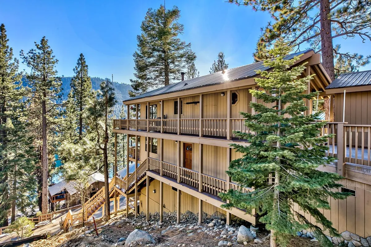 View of house from E Reed Ave with the stairs down to Donner Ave. - 14469 E Reed Ave