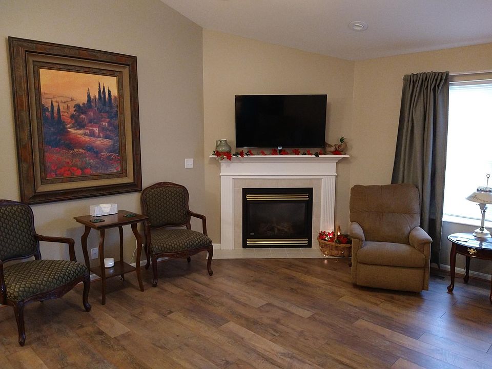 Living room with 50" t.v., recliners, and hard floors for less allergies.