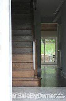 View from front door
						:
						Step going upstairs. out the back door through a hallway, kitchen and grand room