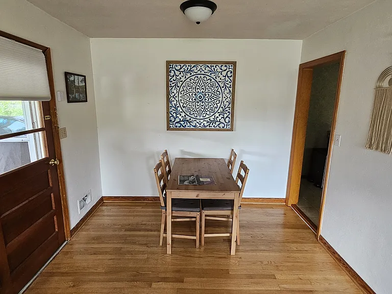 Additional photo of living room, shown furnished for layout example only. Rental is offered unfurnished.