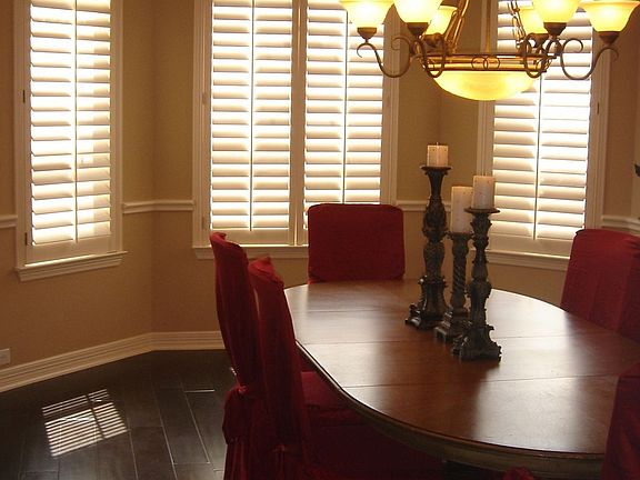 Formal Dining with Plantation shutters and mood lighting