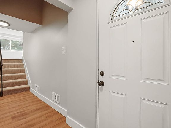 Entrance Foyer. New Carpet, LVP & freshly painted