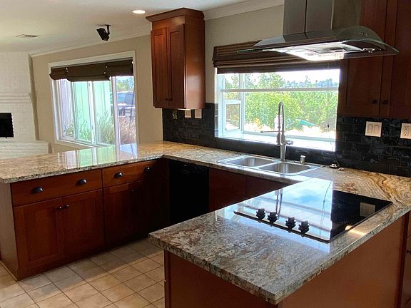 Kitchen area with large bay window facing west to view beautiful sunsets