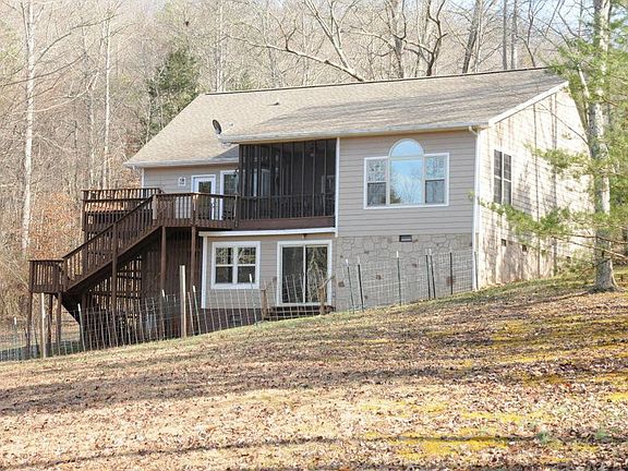 Rear of home with bonus room