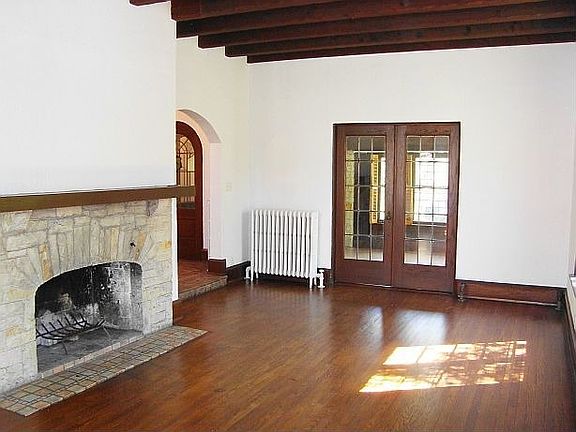 Great Room With Beamed Ceiling