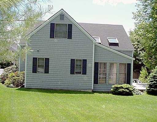 DESIRABLE BROOKSIDE CONDO WITH SUNROOM