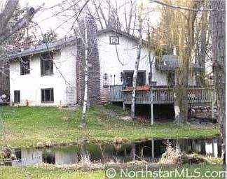 The property features a huge 2 tired deck, maintenance free exterior, new wind