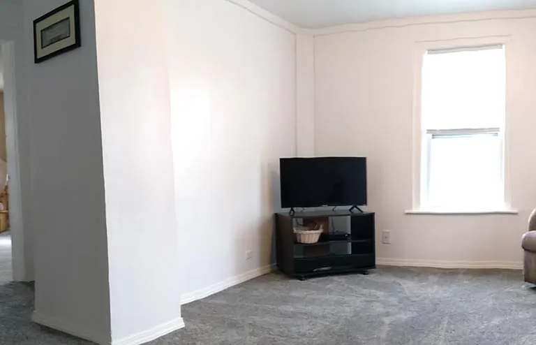 Smart TV with DVD player and speaker.