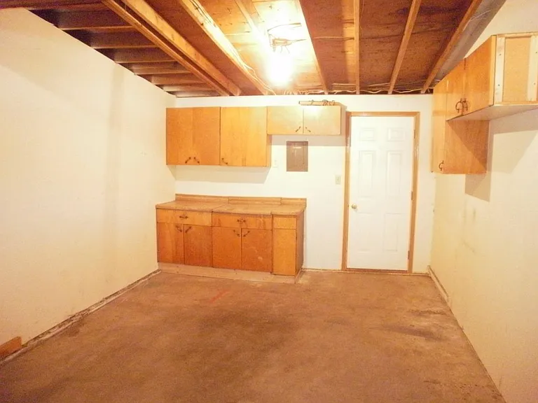 Garage with door to back yard