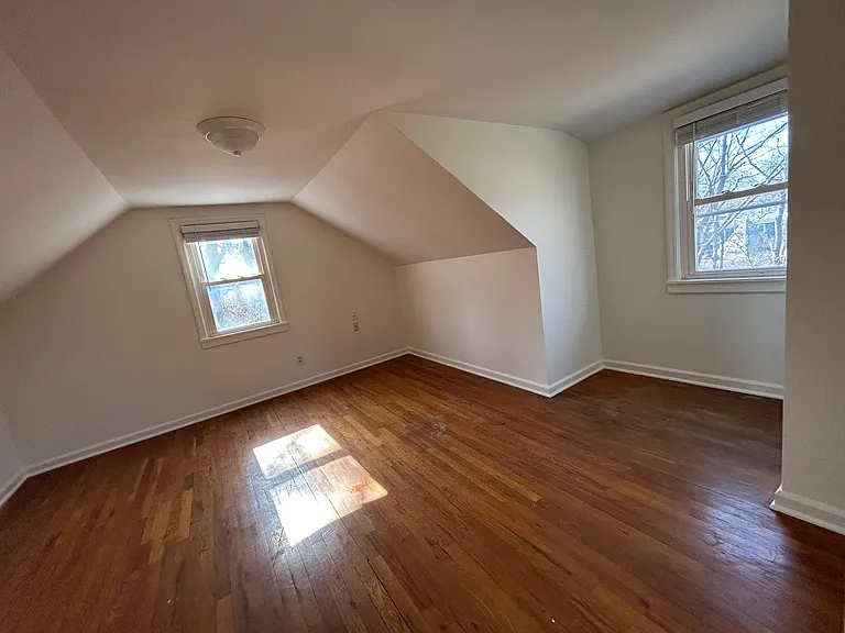 Large upstairs bedroom with neat nooks and a large closet.