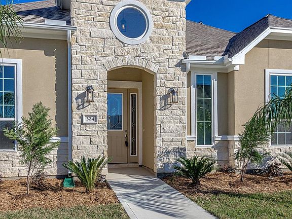 COME AND SEE THIS INCREDIBLE LOCATION FOR YOURSELF. YOU'LL LOVE THE EXPANDED OUTDOOR LIVING AREA THAT OVERLOOKS THE LAKE.