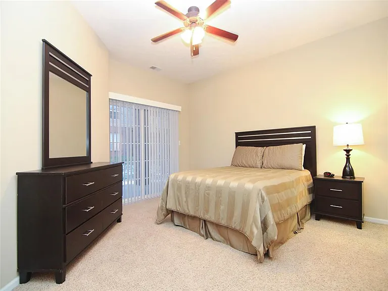Unwind in your oversized bedroom with direct patio access, plush carpeting, and room for a full furniture set.