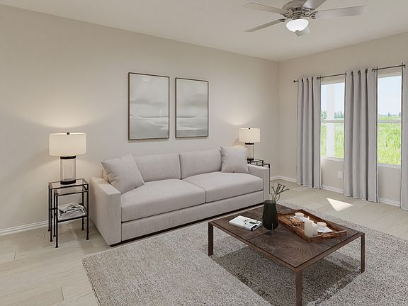 Kick your feet up after a long day in your cozy living space.