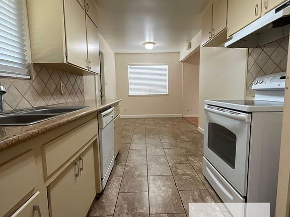 3rd image of 4442 N Manila Ave