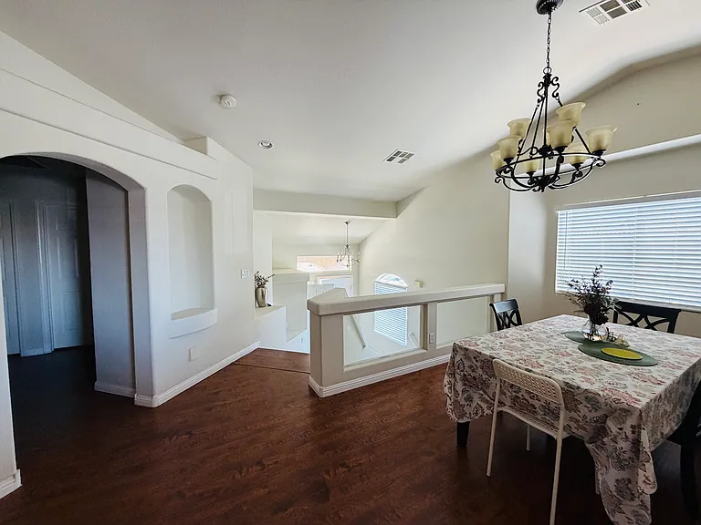 Open shared dining and upstairs living space