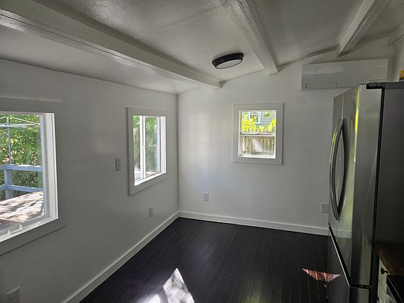 Kitchen- with view & entrance to the back deck.